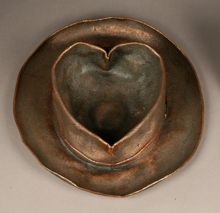 The hat bronzed with love.