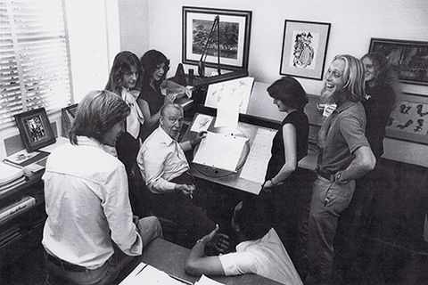 Eric Larson surrounded by animation trainees Lorna Pomeroy Cook, Heidi Guedel, Bill Kroyer, Dan Haskett, Emily Jiuliano, Henry Selick, and Becky Canfield, 1978. Courtesy of Walt Disney Archives Photo Library © Disney