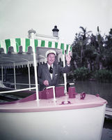 Walt Disney on Jungle Cruise boat, 1955; courtesy of the Walt Disney Archives, Photo Library, © Disney 