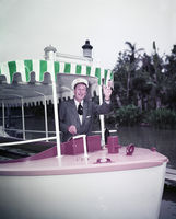 Walt Disney on Jungle Cruise boat, 1955; courtesy of the Walt Disney Archives, Photo Library, © Disney
